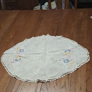 Embroidered white linen crocheted Lace Trim center mat measures: 25.5" X 19"